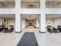 Inviting lobby area with comfortable seating, tiled floors, and a sophisticated atmosphere at 2479 Peachtree Ne Rd # 407, Atlanta, GA 30305