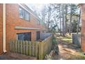Small fenced patio area adjacent to the home at 3318 Northcrest Rd # D, Atlanta, GA 30340