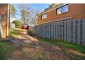 Small backyard with a path and fence at 3318 Northcrest Rd # D, Atlanta, GA 30340
