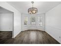 Formal dining room with hardwood floors and a chandelier at 2885 Field Spring Dr, Lithonia, GA 30058