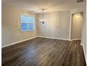 Bright dining room featuring hardwood floors and a chandelier at 3030 Parkland Vw, Atlanta, GA 30331