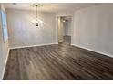 Spacious dining room with hardwood floors and a chandelier at 3030 Parkland Vw, Atlanta, GA 30331