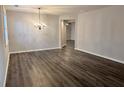 Spacious dining room with hardwood floors and a chandelier at 3030 Parkland Vw, Atlanta, GA 30331