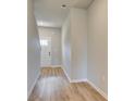 Light and bright entryway with wood-look flooring at 18 Camellia Dr, Fairburn, GA 30213