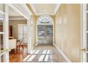 Bright entryway with tile floors and French doors leading to the backyard at 5915 Riverwood Dr, Atlanta, GA 30328