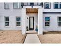 Close-up of a modern townhouse exterior with clean lines and updated finishes at 1072 Brookglynn Trce, Decatur, GA 30032
