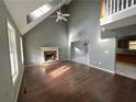 Spacious living room with hardwood floors and a fireplace at 166 Greentree Trl, Temple, GA 30179