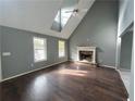Spacious living room with hardwood floors and a fireplace at 166 Greentree Trl, Temple, GA 30179