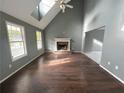 Spacious living room with hardwood floors and a fireplace at 166 Greentree Trl, Temple, GA 30179