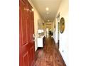 Bright entryway with hardwood floors and modern decor at 3909 Makeover Ct, Atlanta, GA 30349