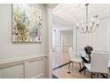 Formal dining room with glass table and white chairs at 3636 Habersham Nw Rd # 1108, Atlanta, GA 30305