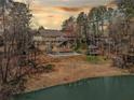 Spacious backyard with an in-ground pool, gazebo, and lake access at 19 Spring Lake Trl, White, GA 30184