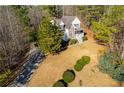 Two-story house with stone accents and a large yard at 121 Rachel Blvd, Temple, GA 30179