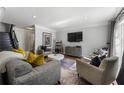 Inviting living room boasts recessed lighting, hardwood floors, and neutral color palette with comfortable seating at 1634 Ponce De Leon Ne Ave # 503, Atlanta, GA 30307