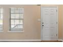 Entryway with white door and window blinds at 3607 Ginnis Sw Dr # 7, Atlanta, GA 30331