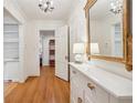 Bright entry with hardwood floors, built-in shelving, and a large mirror at 521 E Wesley Ne Rd, Atlanta, GA 30305