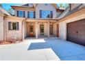 Inviting home entrance with a stylish front door and well-kept brickwork at 43 Iroquois Ct, Covington, GA 30014