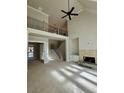 Spacious living room with high ceilings and a fireplace at 43 Iroquois Ct, Covington, GA 30014