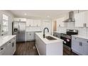 Modern kitchen featuring stainless steel appliances and an island at 5603 Owens Dr, Austell, GA 30106