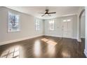 Bright living room with hardwood floors and neutral walls at 5603 Owens Dr, Austell, GA 30106