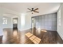 Spacious living room with hardwood floors and a decorative wall at 5603 Owens Dr, Austell, GA 30106