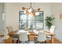 Bright dining room with hardwood floors and a unique light fixture at 89 1St Ne Ave, Atlanta, GA 30317