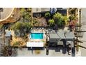 Aerial view of the pool, cabana and well landscaped yard at 3532 S Fulton Ave, Hapeville, GA 30354