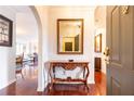 Grand entryway with hardwood floors and ornate console table at 2499 Peachtree Ne Rd # 504, Atlanta, GA 30305