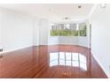 Bright living room with hardwood floors and large windows offering city views at 2499 Peachtree Ne Rd # 504, Atlanta, GA 30305