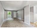 Bright living room featuring gray walls and carpet at 516 Fairlane Nw Cir, Atlanta, GA 30331