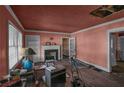 Living room with hardwood floors and a fireplace at 1142 Cahaba Dr, Atlanta, GA 30311