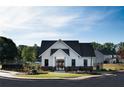 Community pool house with farmhouse style architecture at 2116 Stillhaven Pl, Douglasville, GA 30135