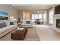 Bright living room featuring hardwood floors and a view to the dining area at 407 Coleraine Se, Smyrna, GA 30080