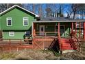 Two story home with red stairs and a covered porch at 5912 Jacobs Rd, Acworth, GA 30102