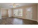 Bright living room with hardwood floors and large windows at 1937 Windsor Sw Dr, Atlanta, GA 30311