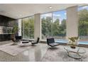 Lobby with seating, large windows, and pool view at 215 Piedmont Ne Ave # 1707, Atlanta, GA 30308