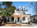 Craftsman style home with a front porch and landscaping at 17 Rockyford Ne Rd, Atlanta, GA 30317