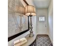 Bright entryway with a charming console table and rug at 1934 Asher Ln # 060, Conyers, GA 30013