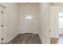 Bright entryway with a white door and trim and luxury vinyl plank flooring throughout at 161 Adair Se Ave, Atlanta, GA 30315