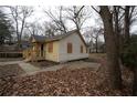 Side view of charming cottage with new wooden deck at 2064 Chicago Nw Ave, Atlanta, GA 30314