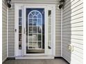 White front door with a glass insert and sidelights at 4157 Alveston Dr, Atlanta, GA 30349