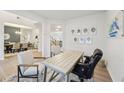 Bright home office space with a desk and two chairs at 1401 Stephens View Dr, Loganville, GA 30052