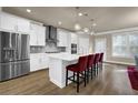 Modern kitchen featuring white cabinets, stainless steel appliances, and an island at 3179 Clairebrooke Ave, Atlanta, GA 30341