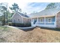 Brick house with a front porch and walkway at 4801 Daniel Mill Rd, Winston, GA 30187