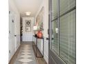 Bright and airy entryway with a console table and stylish decor at 2580 Ravencliff Dr # 159, Austell, GA 30168
