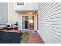 Inviting patio area with brick flooring, slider, and comfortable outdoor seating at 2678 Greentree Se Dr, Marietta, GA 30067