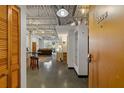 Open concept entryway with view of living room and kitchen at 5200 Peachtree Rd # 3116, Chamblee, GA 30341