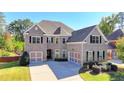 Two-story house with a large backyard and a swimming pool at 1190 Smithwell Pt, Kennesaw, GA 30152