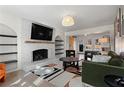 Spacious living room with fireplace and large windows at 5371 Tall Oak Dr, Marietta, GA 30068
