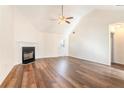 Spacious living room with hardwood floors and a fireplace at 1013 Bluecoat Cir, Hampton, GA 30228